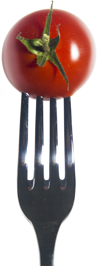 A tomato on a fork